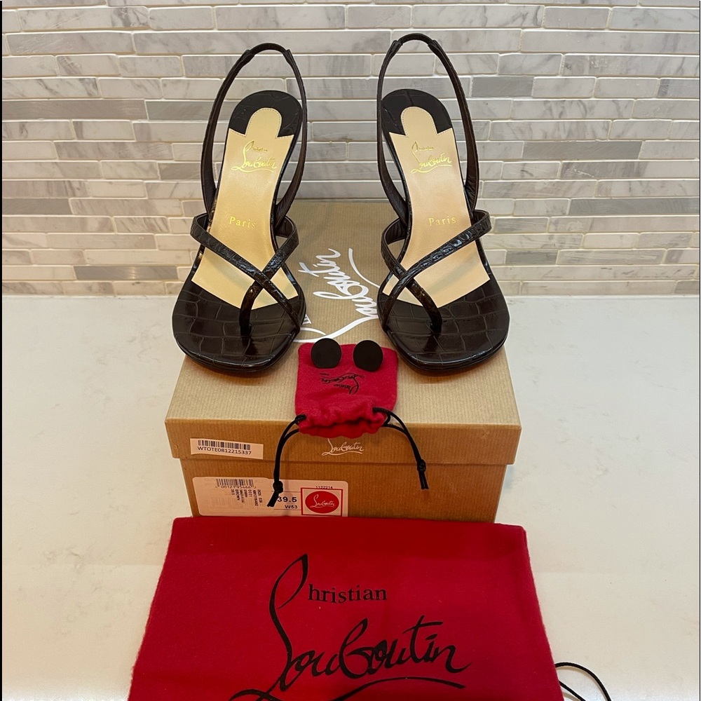 CHRISTIAN LOUBOUTIN
Taralita 85 croc-effect leather Slingback Sandal
